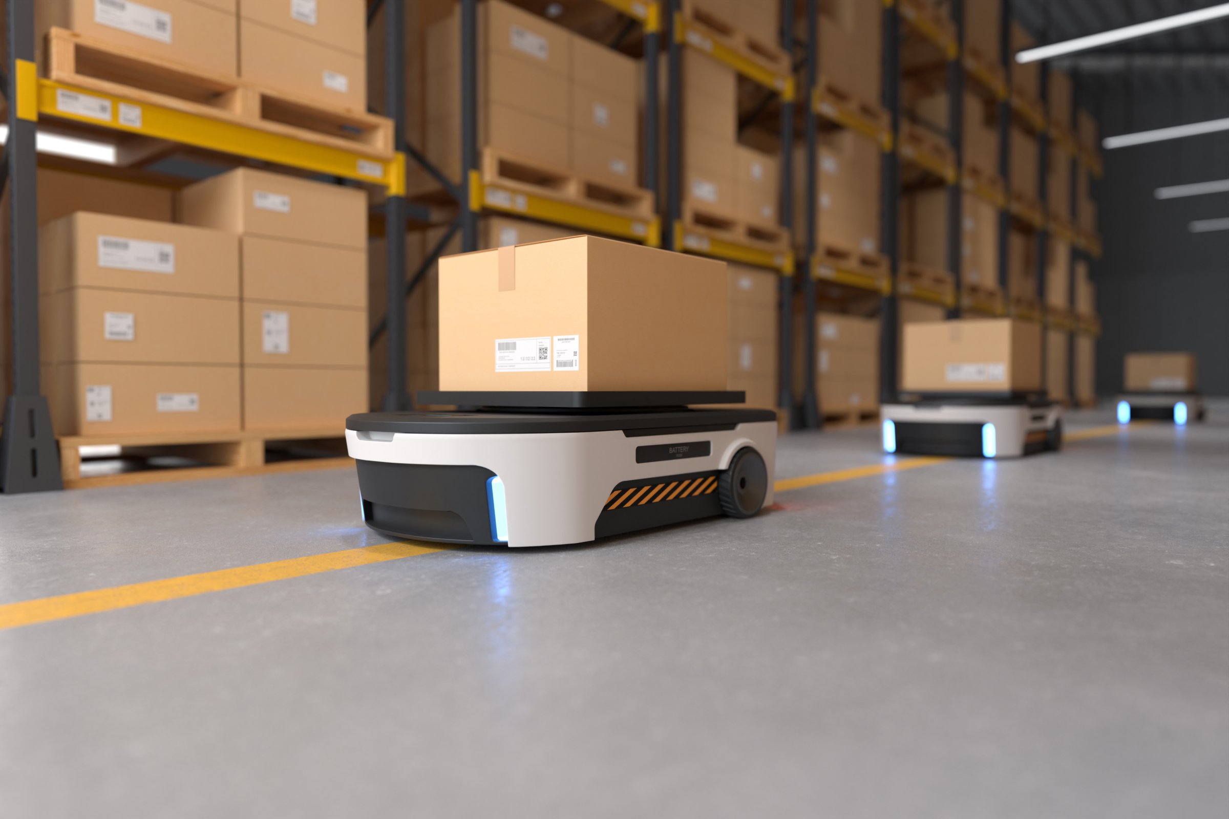 Roboter frakter pakker i et automatisert lager
